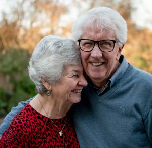 Senior couple discussing Medicare coverage options with a professional in Vancouver, WA